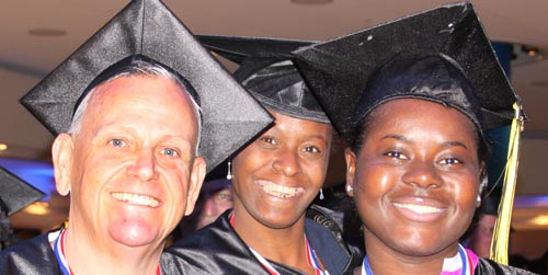 Three Smiling Grads